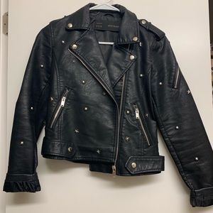 Faux leather jacket with stars and studs